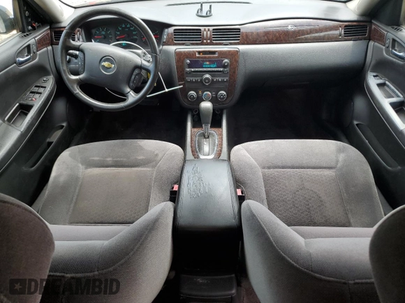 2014 Chevrolet Impala LS with VIN 2G1WA5E33E1127966, listed as a Copart auction lot 61458245 with 166,744 mi miles and Salvage title. Bid and sale history available at DreamBid. Image 8.