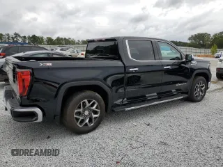 2023 GMC Sierra 1500 SLT z VIN 3GTUUDE87PG106169, wystawiony jako Copart lot #71252284 z przebiegiem 29 136 mil mil oraz Szkoda całkowita • Salvage title. Historia ofert i sprzedaży dostępna na DreamBid. Obrazek 3.