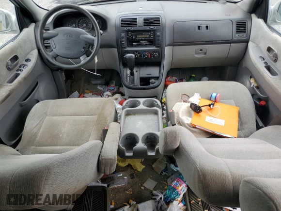 2005 Kia Sedona LX with VIN KNDUP132856712907, listed as a Copart auction lot 75751424 with 177,893 mi miles and Salvage Title. Bid and sale history available at carsss.com. Image 8.