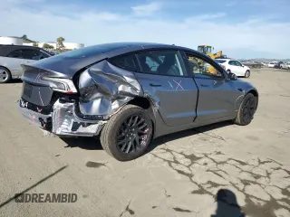 2025 Tesla Model 3 Long Range with VIN 5YJ3E1EA8SF890337, listed as a Copart auction lot 45023425 with 1,765 mi miles and Salvage Title. Bid and sale history available at DreamBid. Image 3.