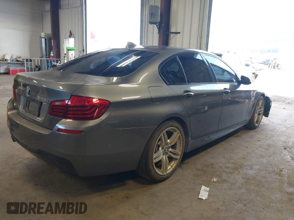 2014 BMW 5 Series 528i xDrive with VIN WBA5A7C5XED613856, listed as a IAAI auction lot 42018901 with 121,783 mi miles and . Bid and sale history available at DreamBid. Image 4.