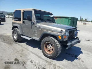 2002 Jeep Wrangler Sport with VIN 1J4FA49S72P765939, listed as a Copart auction lot 50615035 with 210,516 mi miles and Salvage Title. Bid and sale history available at carsss.com. Image 4.