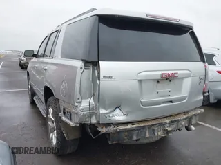 2015 GMC Yukon SLT with VIN 1GKS2BKCXFR131919, listed as a IAAI auction lot 41664827 with 149,398 mi miles. Bid and sale history available at carsss.com. Image 6.