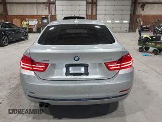 2016 BMW 4 Series 428i xDrive with VIN WBA4C9C5XGG138843, listed as a IAAI auction lot 41747358 with 63,804 mi miles and . Bid and sale history available at DreamBid. Image 16.