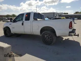 2004 Ford F-250 XL with VIN 1FTNX20PX4EA22882, listed as a Copart auction lot 79014334 with 262,447 mi miles and Salvage title. Bid and sale history available at DreamBid. Image 2.