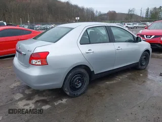 2010 Toyota Yaris with VIN JTDBT4K37A1363616, listed as a IAAI auction lot 41907622 with 311,836 mi miles. Bid and sale history available at carsss.com. Image 4.