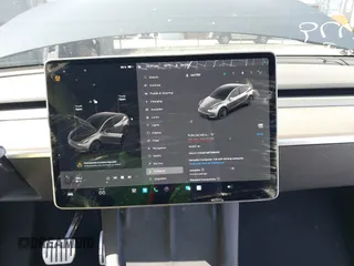 2021 Tesla Model Y Performance with VIN 5YJYGDEF1MF268405, listed as a IAAI auction lot 41818331 with 43,621 mi miles and . Bid and sale history available at DreamBid. Image 18.