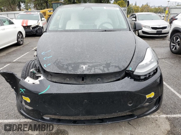 2021 Tesla Model Y Long Range with VIN 5YJYGDEEXMF294556, listed as a Copart auction lot 46668035 with 42,772 mi miles and Salvage Title. Bid and sale history available at DreamBid. Image 5.