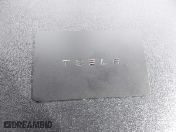 2020 Tesla Model 3 Long Range z VIN 5YJ3E1EB0LF600098, wystawiony jako IAAI lot #41071258 z przebiegiem 149 939 mil mil oraz . Historia ofert i sprzedaży dostępna na DreamBid. Obrazek 11.