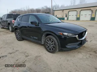 2018 Mazda CX-5 Touring with VIN JM3KFBCM2J0427786, listed as a Copart auction lot 45539345 with 62,989 mi miles and Salvage Title. Bid and sale history available at carsss.com. Image 4.