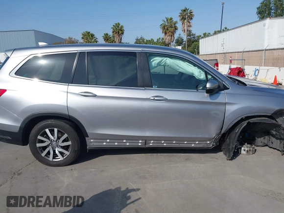 2021 Honda Pilot EX with VIN 5FNYF5H37MB014384, listed as a IAAI auction lot 42412500 with 36,934 mi miles and . Bid and sale history available at DreamBid. Image 14.
