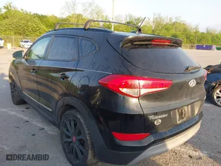 2017 Hyundai Tucson Value with VIN KM8J33A2XHU462806, listed as a IAAI auction lot 42045963 with 102,678 mi miles. Bid and sale history available at carsss.com. Image 3.