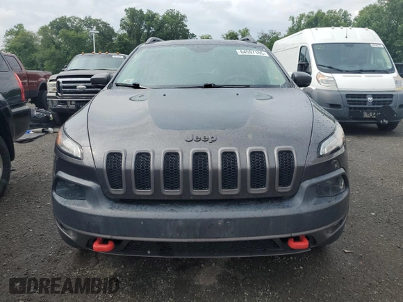 2015 Jeep Cherokee Trailhawk with VIN 1C4PJMBS0FW655167, listed as a Copart auction lot 64597165 with 193,779 mi miles and Clean title. Bid and sale history available at DreamBid. Image 5.