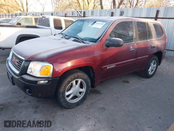 2005 GMC Envoy SLT with VIN 1GKDT13S452115924, listed as a IAAI auction lot 41443704 with 215,402 mi miles. Bid and sale history available at carsss.com. Image 2.