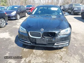 2014 BMW 5 Series 528i xDrive with VIN WBA5A7C56ED613918, listed as a IAAI auction lot 41744501 with 86,917 mi miles and . Bid and sale history available at DreamBid. Image 6.