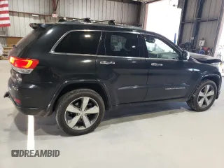 2015 Jeep Grand Cherokee Overland with VIN 1C4RJFCG0FC783375, listed as a Copart auction lot 61966725 with 191,478 mi miles and Salvage title. Bid and sale history available at DreamBid. Image 3.