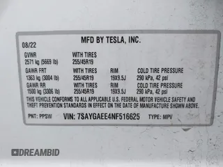 2022 Tesla Model Y Long Range with VIN 7SAYGAEE4NF516625, listed as a IAAI auction lot 41892225 with 33,054 mi miles and . Bid and sale history available at DreamBid. Image 9.