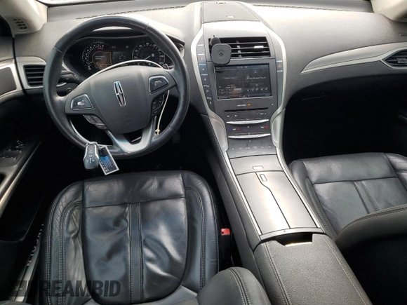 2014 Lincoln MKZ z VIN 3LN6L2JK6ER833317, wystawiony jako Copart lot #50555105 z przebiegiem 157 510 mil mil oraz Szkoda całkowita • Salvage title. Historia ofert i sprzedaży dostępna na DreamBid. Obrazek 8.