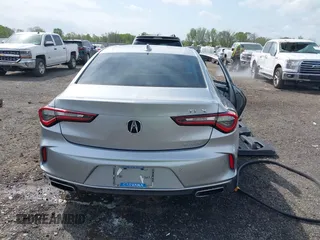 2021 Acura TLX Technology z VIN 19UUB6F41MA002737, wystawiony jako IAAI lot #41925713 z przebiegiem 28 599 mil mil oraz . Historia ofert i sprzedaży dostępna na DreamBid. Obrazek 17.