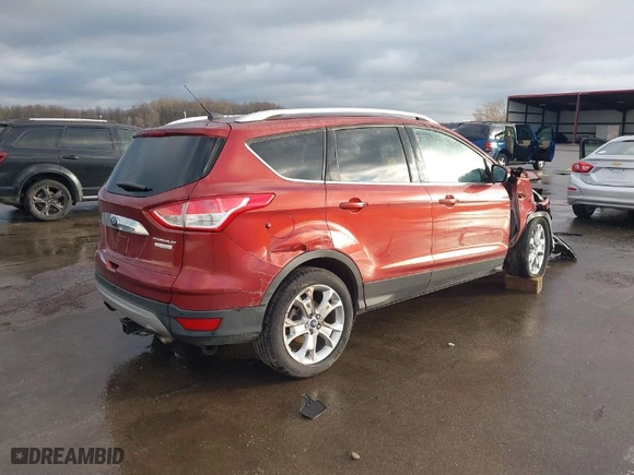 2015 Ford Escape Titanium with VIN 1FMCU0J95FUB27483, listed as a IAAI auction lot 41509309 with 128,810 mi miles. Bid and sale history available at carsss.com. Image 4.