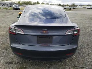 2023 Tesla Model 3 with VIN 5YJ3E1EA7PF395196, listed as a Copart auction lot 51260465 with 41,119 mi miles and Salvage title. Bid and sale history available at DreamBid. Image 6.