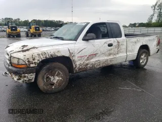 1998 Dodge Dakota SLT с VIN 1B7GL22X6WS693570, выставлен на аукционе Copart как лот 52000825 с пробегом 125 985 миль миль и Списание • Salvage title. История ставок и продаж доступна на DreamBid. Изображение 1.