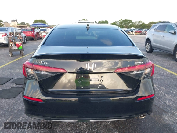 2022 Honda Civic Sport z VIN 2HGFE2F53NH569990, wystawiony jako IAAI lot #41944635 z przebiegiem 20 935 mil mil oraz . Historia ofert i sprzedaży dostępna na DreamBid. Obrazek 17.