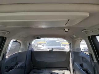 2014 Honda Odyssey Touring z VIN 5FNRL5H92EB059168, wystawiony jako Copart lot #76121914 z przebiegiem 264 715 mil mil oraz Szkoda całkowita • Salvage title. Historia ofert i sprzedaży dostępna na DreamBid. Obrazek 10.