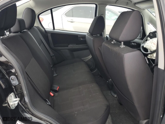 2011 Suzuki SX4 Sedan Sport with VIN JS2YC5A80B6300378, listed as a Copart auction lot 86095334 with 113,238 mi miles and Salvage Title. Bid and sale history available at carsss.com. Image 11.