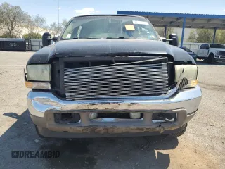 2002 Ford Excursion Limited z VIN 1FMNU43S92EC53835, wystawiony jako Copart lot #60525215 z przebiegiem 207 011 mil mil oraz Szkoda całkowita • Salvage title. Historia ofert i sprzedaży dostępna na DreamBid. Obrazek 5.