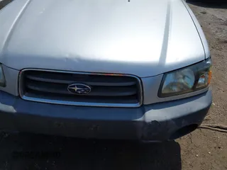 2004 Subaru Forester X with VIN JF1SG63664H736980, listed as a IAAI auction lot 42666843 with 154,405 mi miles and . Bid and sale history available at DreamBid. Image 6.