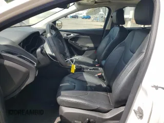 2017 Ford Focus Titanium with VIN 1FADP3N24HL206365, listed as a Copart auction lot 63199965 with 51,435 mi miles and Salvage title. Bid and sale history available at DreamBid. Image 7.