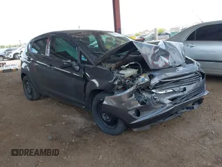 2019 Ford Fiesta SE z VIN 3FADP4EJ1KM142577, wystawiony jako IAAI lot #42196615 z przebiegiem 96 485 mil mil oraz . Historia ofert i sprzedaży dostępna na DreamBid. Obrazek 1.
