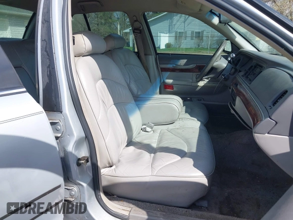 1997 Mercury Grand Marquis LS with VIN 2MELM75W3VX717801, listed as a IAAI auction lot 41920075 with 173,730 mi miles and . Bid and sale history available at DreamBid. Image 5.