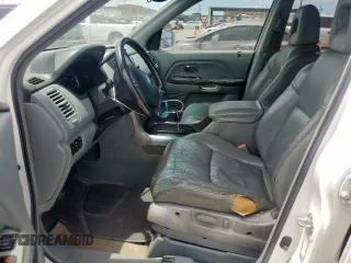 2005 Honda Pilot EX-L z VIN 5FNYF18555B025184, wystawiony jako Copart lot #58084295 z przebiegiem 161 863 mil mil oraz Szkoda całkowita • Salvage title. Historia ofert i sprzedaży dostępna na DreamBid. Obrazek 7.