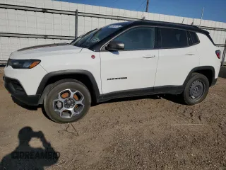 2022 Jeep Compass Trailhawk with VIN 3C4NJDDB5NT148841, listed as a Copart auction lot 52532475 with 57,081 mi miles and Salvage title. Bid and sale history available at DreamBid. Image 1.