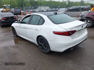 2021 Alfa Romeo Giulia Ti Sport with VIN ZARFAMBN9M7640461, listed as a IAAI auction lot 42329442 with 43,266 mi miles and . Bid and sale history available at DreamBid. Image 3.