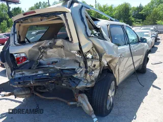 2010 GMC Acadia SLT1 with VIN 1GKLRMEDXAJ195059, listed as a IAAI auction lot 42255816 with Not provided miles and . Bid and sale history available at DreamBid. Image 4.