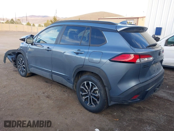 2023 Toyota Corolla Cross Hybrid S with VIN 7MUFBABG3PV005338, listed as a IAAI auction lot 41633311 with 32,082 mi miles and . Bid and sale history available at DreamBid. Image 3.