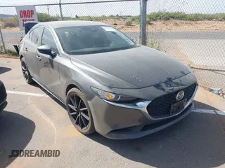 2021 Mazda 3 Select z VIN JM1BPABL7M1334057, wystawiony jako IAAI lot #42135292 z przebiegiem 51 598 mil mil oraz . Historia ofert i sprzedaży dostępna na DreamBid. Obrazek 1.