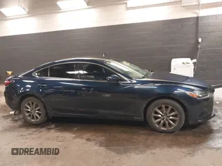 2018 Mazda Mazda6 Sport with VIN JM1GL1UMXJ1330989, listed as a IAAI auction lot 41355353 with 52,869 mi miles. Bid and sale history available at carsss.com. Image 13.