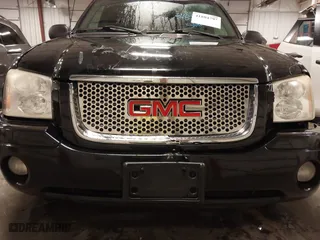 2004 GMC Envoy SLE with VIN 1GKDT13S542265104, listed as a IAAI auction lot 41884797 with 154,190 mi miles. Bid and sale history available at carsss.com. Image 19.
