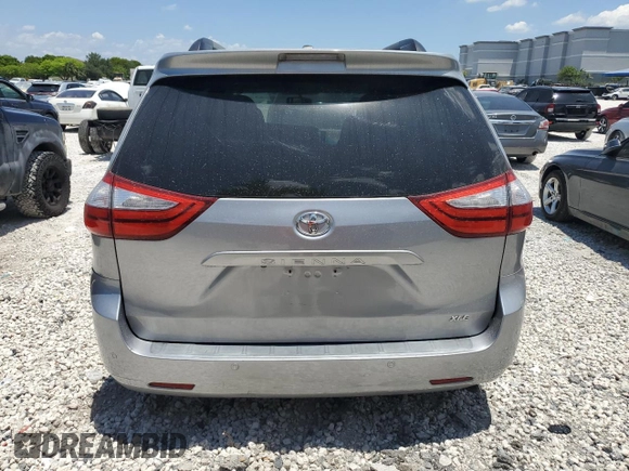 2015 Toyota Sienna XLE z VIN 5TDYK3DC3FS631916, wystawiony jako Copart lot #57876815 z przebiegiem 76 986 mil mil oraz Czysty tytuł • Clean title. Historia ofert i sprzedaży dostępna na DreamBid. Obrazek 6.