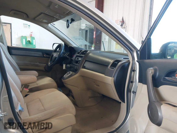 2008 Honda CR-V LX with VIN JHLRE38338C042071, listed as a IAAI auction lot 42047743 with 223,027 mi miles and . Bid and sale history available at carsss.com. Image 5.