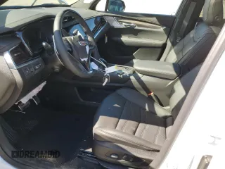 2025 Cadillac XT6 AWD Sport z VIN 1GYKPHRS5SZ101521, wystawiony jako Copart lot #48552185 z przebiegiem 262 mil mil oraz Szkody całkowita. Historia ofert i sprzedaży dostępna na DreamBid. Obrazek 7.