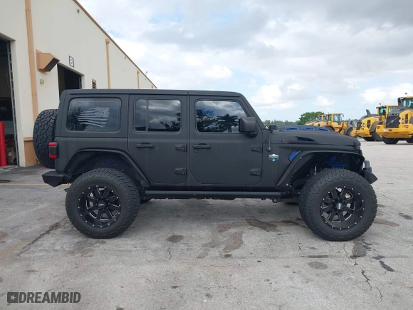 2018 Jeep Wrangler Unlimited Sport S with VIN 1C4HJXDG2JW228483, listed as a IAAI auction lot 41710364 with 56,970 mi miles. Bid and sale history available at carsss.com. Image 13.