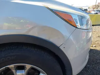 2013 Ford Escape SEL with VIN 1FMCU9HX2DUC40443, listed as a IAAI auction lot 42047208 with 194,413 mi miles. Bid and sale history available at carsss.com. Image 6.