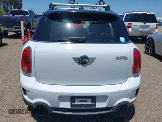 2014 MINI Countryman S z VIN WMWZC3C56EWP52407, wystawiony jako IAAI lot #42255716 z przebiegiem 74 943 mil mil oraz . Historia ofert i sprzedaży dostępna na DreamBid. Obrazek 16.