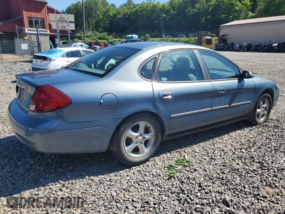 2001 Ford Taurus SE with VIN 1FAFP53U61A161763, listed as a Copart auction lot 43317165 with 64,025 mi miles and Salvage title. Bid and sale history available at DreamBid. Image 3.