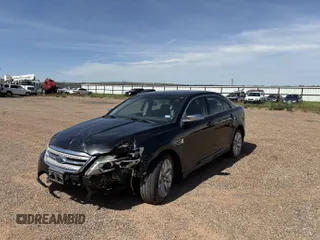 2010 Ford Taurus Limited with VIN 1FAHP2FW3AG125031, listed as a IAAI auction lot 42801338 with 128,310 mi miles and . Bid and sale history available at DreamBid. Image 2.